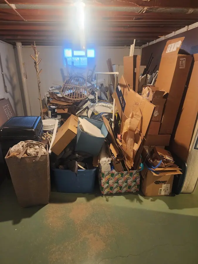 Roll-off dumpster container at job site for 15 Yard Dumpster Rental in Sandy